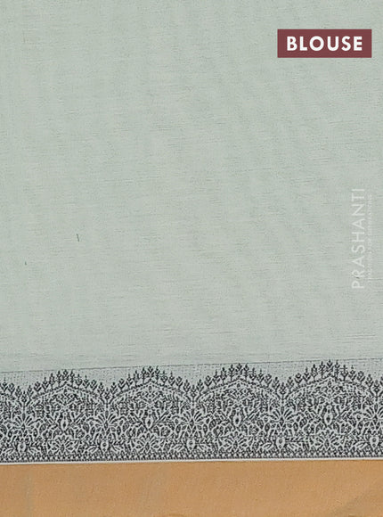 Nithyam cotton saree pastel green and dark mustard with allover checked pattern & zari buttas in borderless style