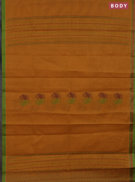 Nithyam cotton saree dark mustard and green with allover self emboss & thread woven buttas and simple border