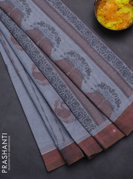 Nithyam cotton saree grey and brown shade with allover self emboss & thread woven buttas and simple border