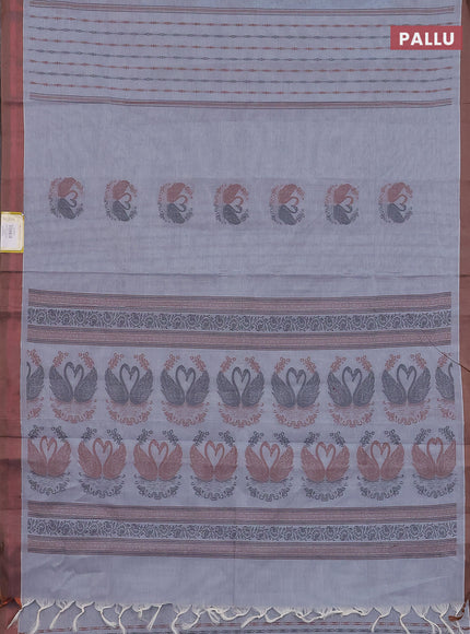 Nithyam cotton saree grey and brown shade with allover self emboss & thread woven buttas and simple border