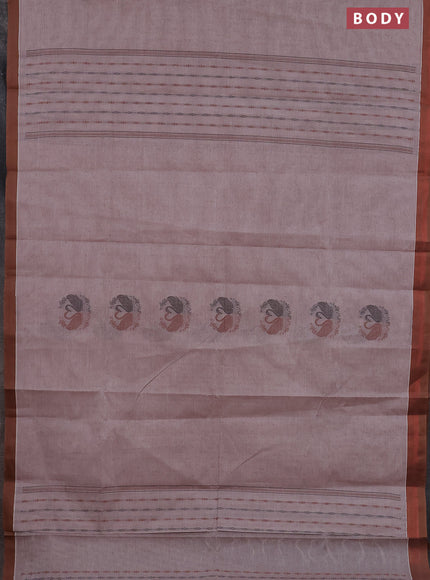 Nithyam cotton saree pastel brown shade and brown with allover self emboss & thread woven buttas and simple border