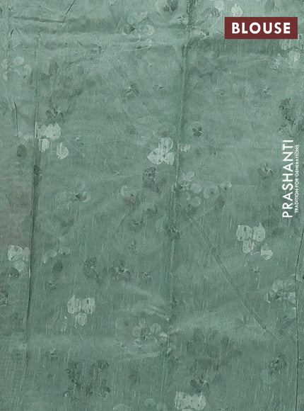 Semi tussar saree pastel green with allover floral digital prints and zari woven kantha work border