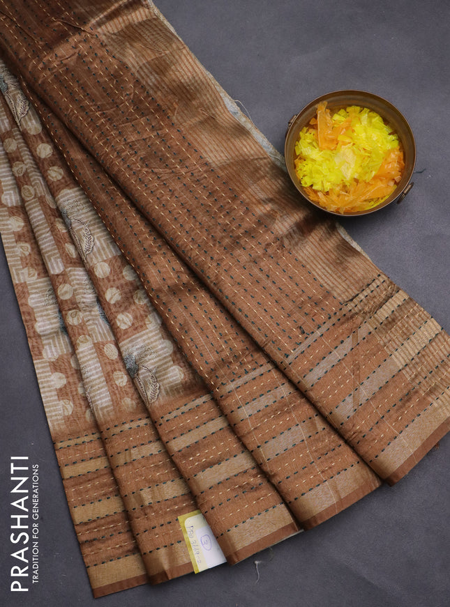 Semi tussar saree sandal and brown with allover dabu prints and kantha stitch work border