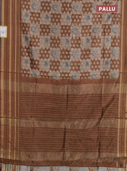 Semi tussar saree sandal and brown with allover dabu prints and kantha stitch work border