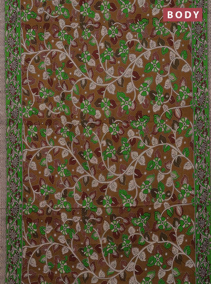 Kalamkari cotton saree dark mustard and green with allover prints and printed border