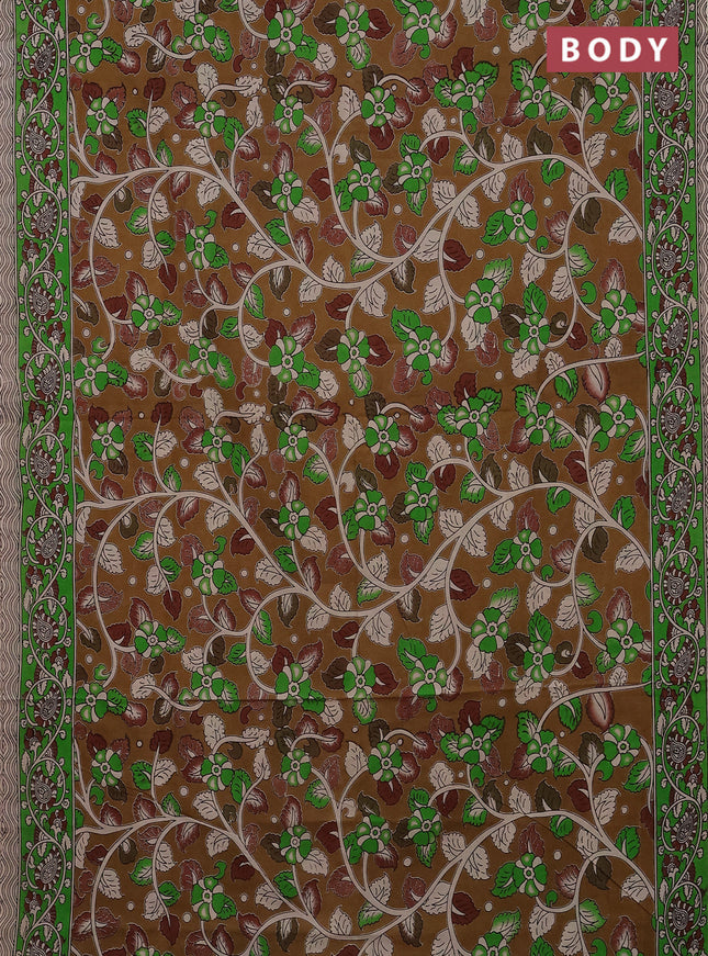 Kalamkari cotton saree dark mustard and green with allover prints and printed border