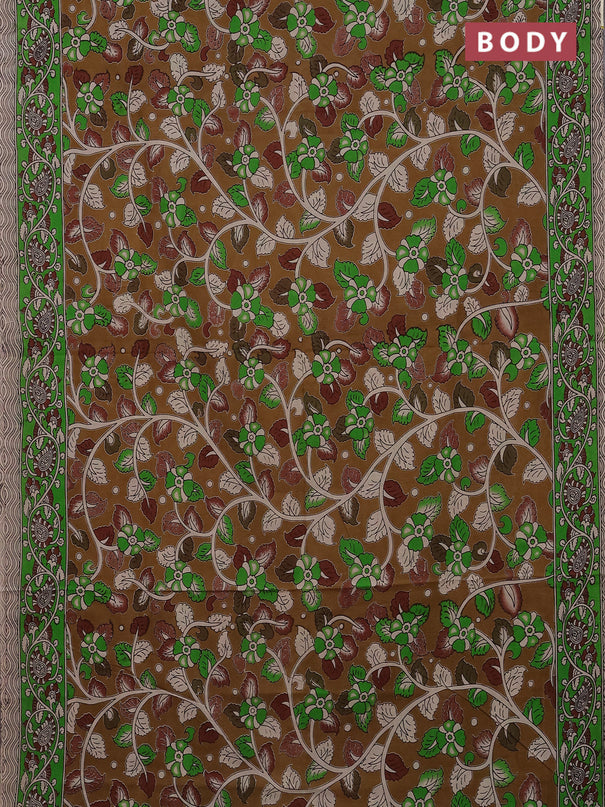 Kalamkari cotton saree dark mustard and green with allover prints and printed border