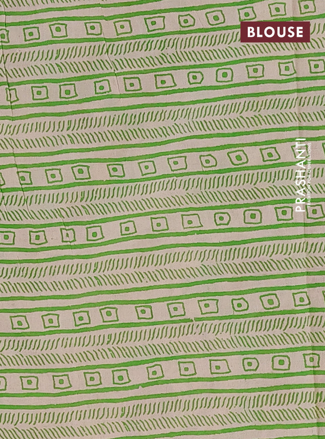 Kalamkari cotton saree dark mustard and green with allover prints and printed border