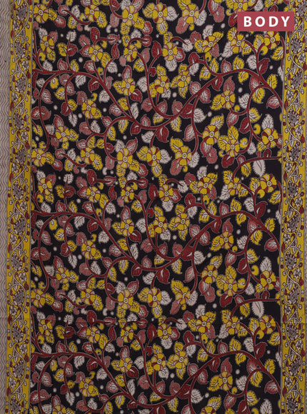 Kalamkari cotton saree black and yellow with allover prints and printed border