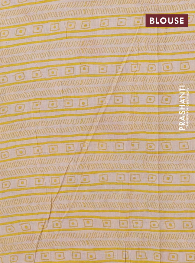Kalamkari cotton saree black and yellow with allover prints and printed border