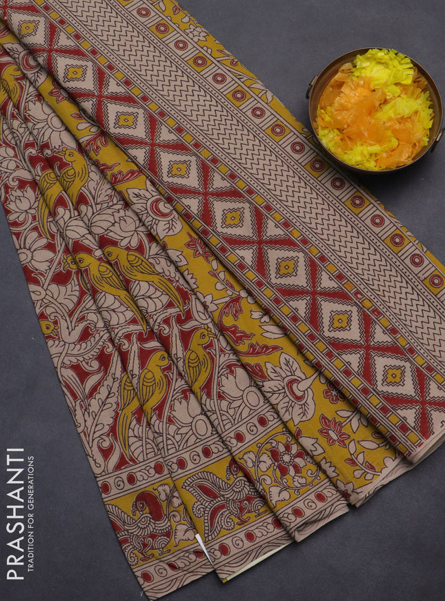 Kalamkari cotton saree maroon and yellow with allover prints and printed border