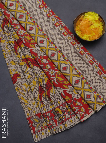 Kalamkari cotton saree yellow and red with allover prints and printed border