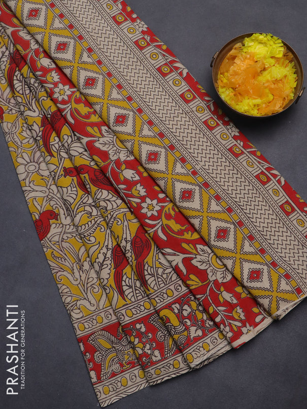 Kalamkari cotton saree yellow and red with allover prints and printed border
