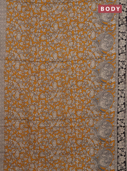Kalamkari cotton saree yellow and black with allover prints and printed border