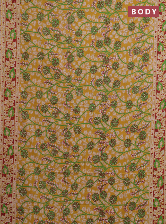 Kalamkari cotton saree yellow and maroon with allover prints and printed border