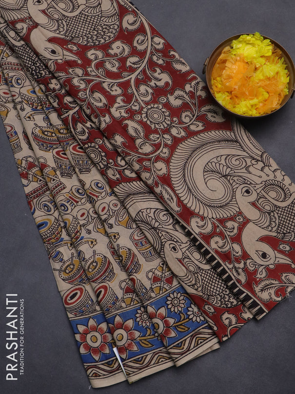 Kalamkari cotton saree beige and blue with allover musical instrument prints and printed border