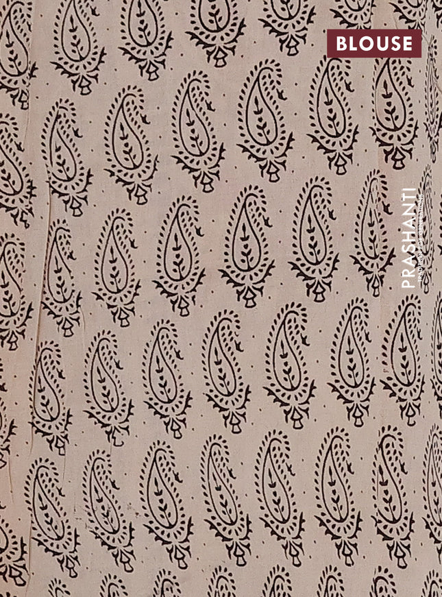 Kalamkari cotton saree beige and blue with allover musical instrument prints and printed border