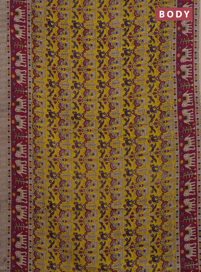 Kalamkari cotton saree yellow and magenta pink with allover prints and printed border