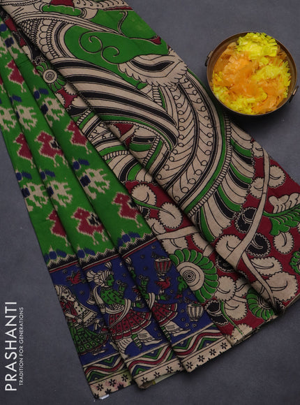 Kalamkari cotton saree green and blue with allover ikat prints and printed border