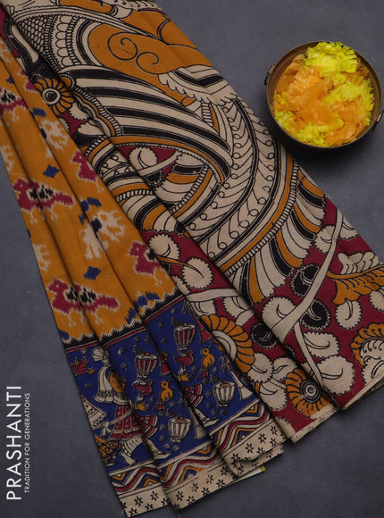 Kalamkari cotton saree mustard yellow and blue with allover ikat prints and printed border