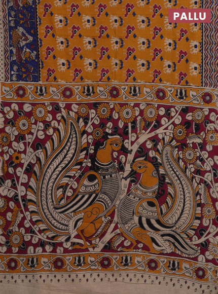 Kalamkari cotton saree mustard yellow and blue with allover ikat prints and printed border