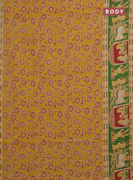 Kalamkari cotton saree yellow and light green with allover prints and printed border