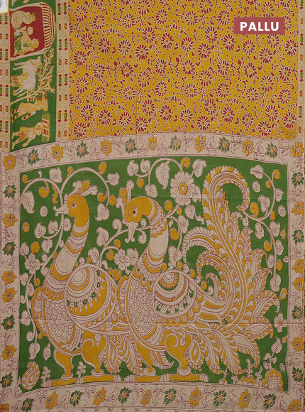 Kalamkari cotton saree yellow and light green with allover prints and printed border