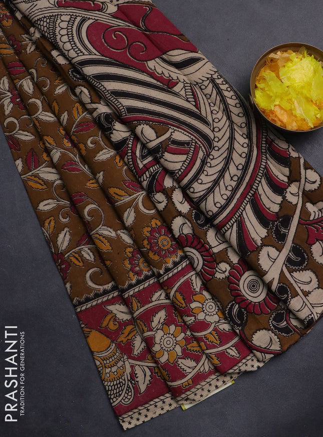Kalamkari cotton saree dark mustard and dark pink with allover prints and printed border