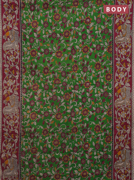 Kalamkari cotton saree light green and pink with allover prints and printed border