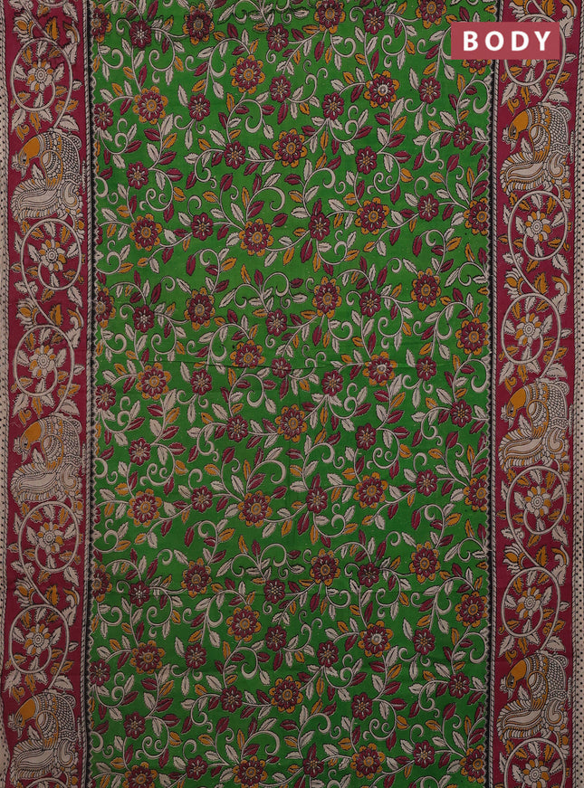 Kalamkari cotton saree light green and pink with allover prints and printed border