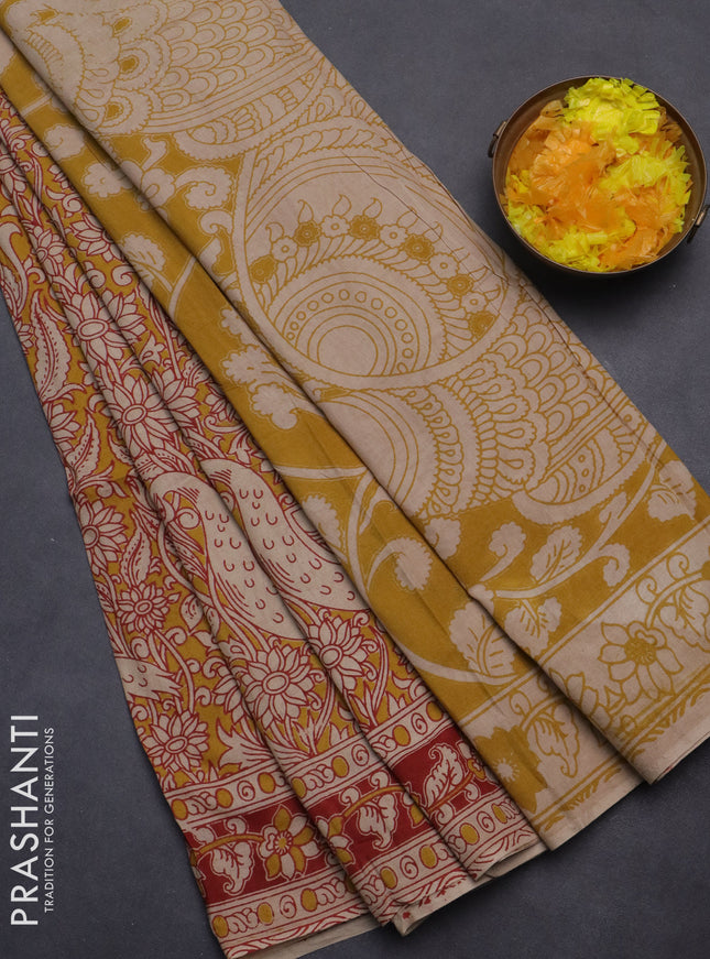 Kalamkari cotton saree mustard yellow and red with allover prints and printed border