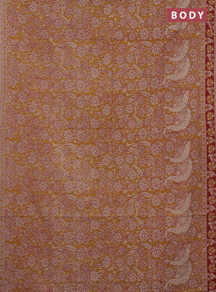 Kalamkari cotton saree mustard yellow and red with allover prints and printed border