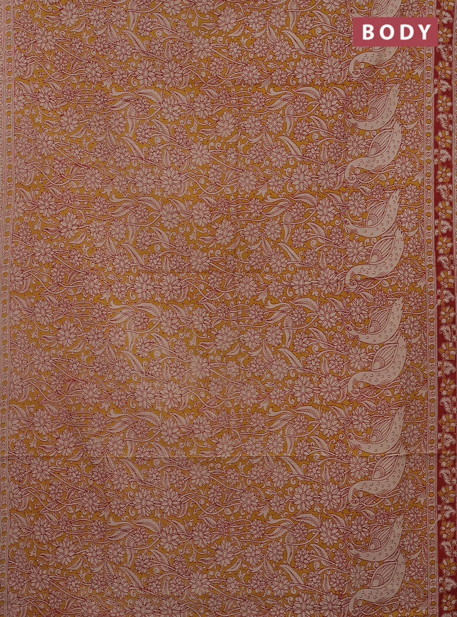 Kalamkari cotton saree mustard yellow and red with allover prints and printed border