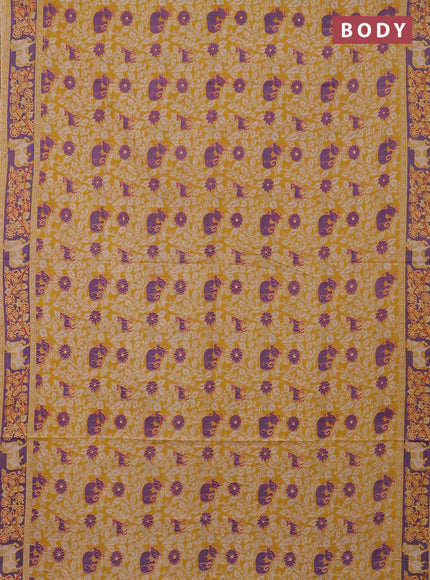 Kalamkari cotton saree mustard yellow and violet with allover prints and printed border