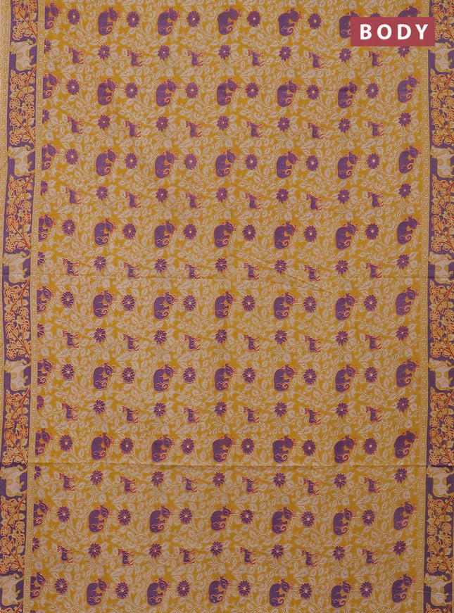 Kalamkari cotton saree mustard yellow and violet with allover prints and printed border