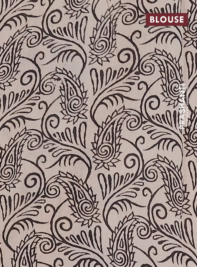 Kalamkari cotton saree black and beige with allover ikat prints and printed border