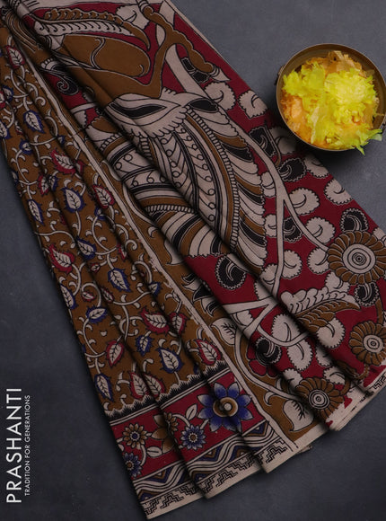 Kalamkari cotton saree dark mustard and pink with allover prints and printed border