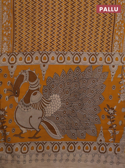 Kalamkari cotton saree dark mustard with allover zig zag prints and printed border
