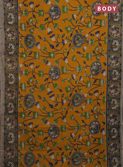 Kalamkari cotton saree mustard yellow and light green with allover prints and printed border
