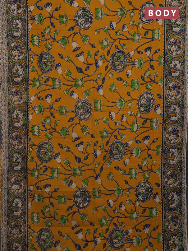 Kalamkari cotton saree mustard yellow and light green with allover prints and printed border