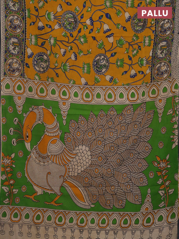 Kalamkari cotton saree mustard yellow and light green with allover prints and printed border
