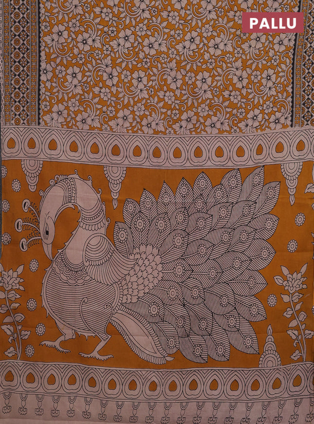 Kalamkari cotton saree dark mustard and beige with allover prints and printed border