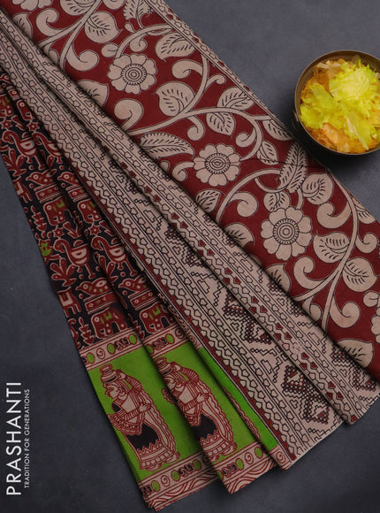 Kalamkari cotton saree black and light green with allover prints and printed border