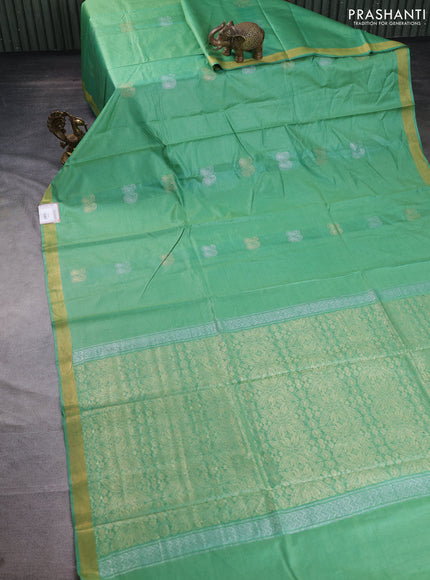 Banana silk saree teal green shade with silver & gold zari woven paisley buttas and zari woven border