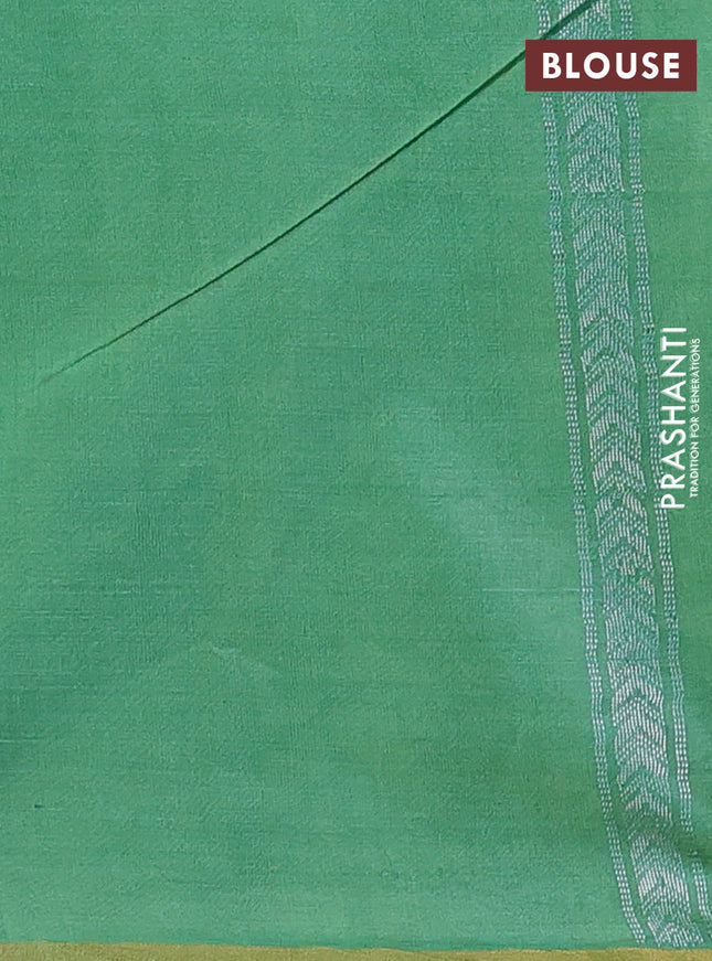 Banana silk saree teal green shade with silver & gold zari woven paisley buttas and zari woven border