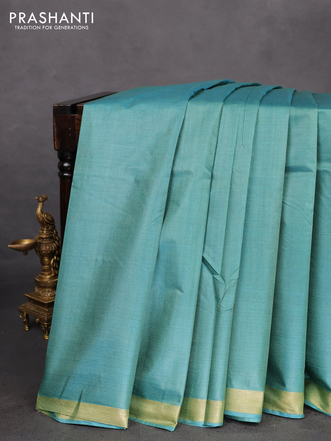 Banana silk saree teal blue with silver & gold zari woven buttas and zari woven border