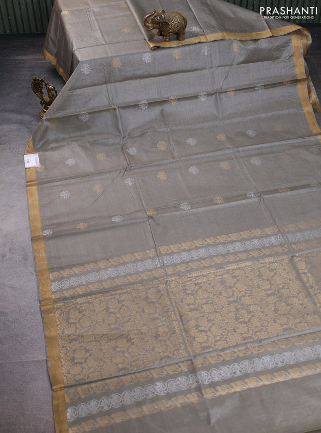 Banana silk saree grey shade with silver & gold zari woven floral buttas and zari woven border