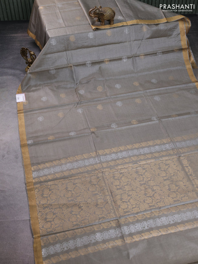 Banana silk saree grey shade with silver & gold zari woven floral buttas and zari woven border