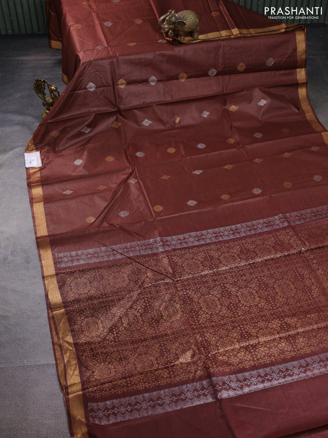 Banana silk saree rust shade with silver & gold zari woven buttas and zari woven border