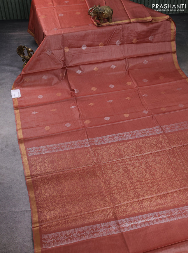 Banana silk saree rust shade with silver & gold zari woven buttas and zari woven border